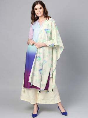 For Your Casual Or Semi-Casuals, Grab This Readymade Plazzo Suit In Off-White And Multi Color. This Suit Is Fabricated On Crepe Paired With Muslin Fabricated Dupatta. 