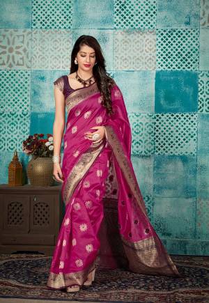 Grab This Beautiful Designer Silk Based Saree In Magenta Pink Color Paired With Contrasting Purple Colored Blouse. This Saree And Blouse Are Fabricated On Banarasi Art Silk Beautified With Weave All Over. 