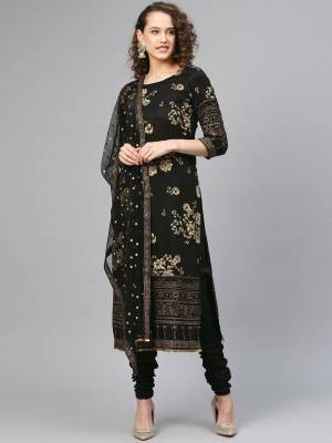 For a Bold And Beautiful Look, Grab This designer Readymade Suit In All over Black Color. Its Printed Top and Bottom Are Polyester Based Paired With Net Fabricated Dupatta. 