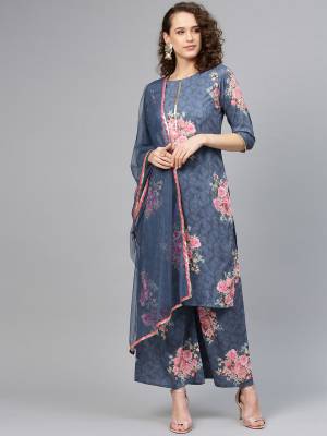 Simple And Elegant Looking Readymade Printed Suit Is Here In Steel Blue Color Paired With Steel Blue Colored Dupatta. Its Top And Bottom Are Fabricated On Muslin Paired With Net Fabricated Dupatta. 