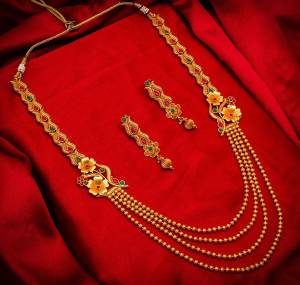 Buy This Heavy Necklace Set For The Upcoming Wedding Season. Pair?This Up With Your Heavy Ethnic Attire And As It Is In Golden Color, It Can Be Paired With Any Colored Attire. Buy Now?