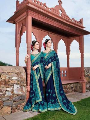 Grab This Heavy Designer Saree In Royal Blue Color Paired With Blue Colored Blouse. This Heavy Embroidered Saree Is Fabricated On Georgette Paired With Art Silk Fabricated Blouse. It Is Easy To Drape And Carry All Day Long. 