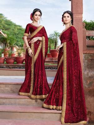 Shine Bright Wearing This Heavy Designer Saree In Maroon Color Paired With Maroon Colored Blouse. This Pretty Saree Is Georgette Based Beautified With Tone To Tone Embroidery Paired With Art Silk Fabricated Blouse. 