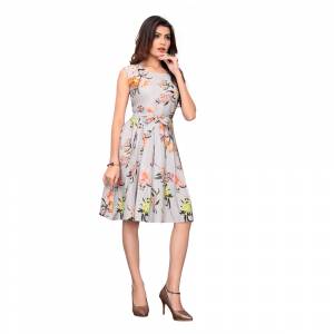 Grab This Lovely Readymade One Piece In Grey Color Fabricated on Crepe. It Is Beautified With Floral Prints Giving A Cute Look The Dress. Also It Is Light Weight, And Its Fabric Is Soft Towards Skin Which Is Easy To Carry All Day Long. 