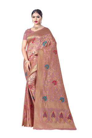 You Will Definitely Earn Lots Of Compliments Wearing This Designer Silk Based Saree In Dusty Pink Color. This Saree Is Banarasi Art Silk Fabricated Paired With Art Silk Blouse. Its Fabric Is Durable And Easy To Care For. 