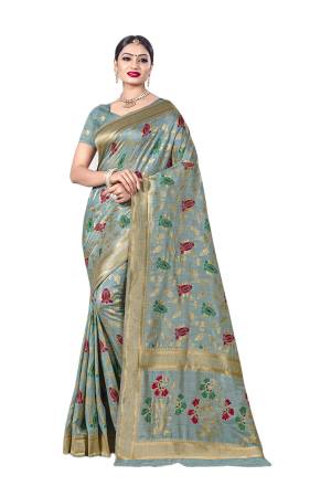 Here Is A Royal Looking Designer Silk Based Saree In Steel Blue Color. This Saree Is Fabricated on Banarasi Art Silk Paired With Art Silk Fabricated Blouse. Its Color And Rich Fabric Will Earn You Lots Of Compliments From Onlookers. 