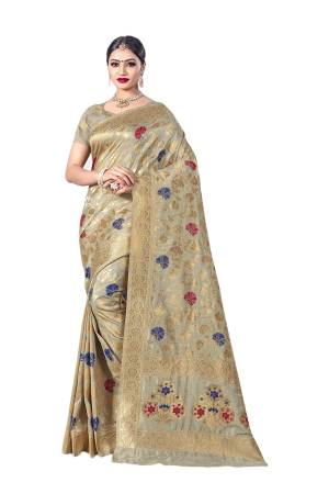 You Will Definitely Earn Lots Of Compliments Wearing This Designer Silk Based Saree In Grey Color. This Saree Is Banarasi Art Silk Fabricated Paired With Art Silk Blouse. Its Fabric Is Durable And Easy To Care For. 