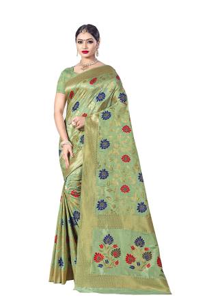 Here Is A Royal Looking Designer Silk Based Saree In Sea Green Color. This Saree Is Fabricated on Banarasi Art Silk Paired With Art Silk Fabricated Blouse. Its Color And Rich Fabric Will Earn You Lots Of Compliments From Onlookers. 
