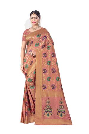You Will Definitely Earn Lots Of Compliments Wearing This Designer Silk Based Saree In Dark Peach Color. This Saree Is Banarasi Art Silk Fabricated Paired With Art Silk Blouse. Its Fabric Is Durable And Easy To Care For. 
