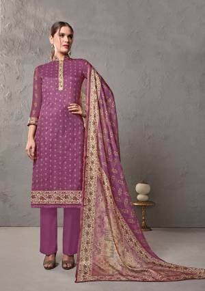 Here Is A Deisgner Straight Suit In Purple Kota Checks Pattern. Its Top And Dupatta Are Cotton Silk Based Paired With Cotton Fabricated Bottom. It Is Beautified With Prints Which Makes Easy And Comfortable To Carry All Day Long. 