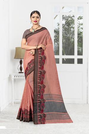 Look Pretty Wearing This Designer Saree In Dark Peach Color. This Saree And Blouse are Linen Based Beautified With Weaved Lace Border. Its Fabric Is Rich And Durable And Will Definitely Earn You Lots Of Compliments From Onlookers. 