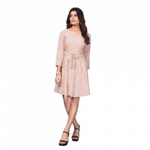 Grab This Lovely Readymade One Piece In Peach Color Fabricated on Crepe. It Is Beautified With Polka Dots Prints Giving A Cute Look The Dress. Also It Is Light Weight, And Its Fabric Is Soft Towards Skin Which Is Easy To Carry All Day Long. 
