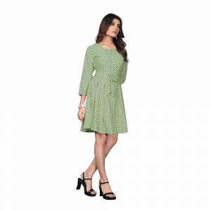 Look Pretty In This Polka Dots Printed Readymade One Piece In Light Green Color. This Pretty Piece Is Fabricated on Crepe And Available In All Regular Sizes. Buy Now.