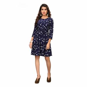 Look Pretty In This Stars Printed Readymade One Piece In Navy Blue Color. This Pretty Piece Is Fabricated on Crepe And Available In All Regular Sizes. Buy Now.