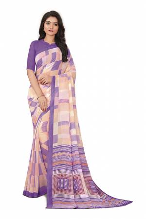 Comfort Is The First Priority When You Go To Your Work Place. So Keeping Your Comfort In Mind This Printed Saree Is Designed As A Uniform For Your Work Place. This Saree And Blouse are Fabricated On Georgette Beautified With Prints Which Is Also Light In Weight And Easy To Carry All Day Long