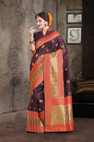 Grab This Designer Silk Based Saree In Wine Color Paired With Wine Colored Blouse. This Saree And Blouse Are Fabricated On Art Silk Beautified With Weave All Over. Buy Now.