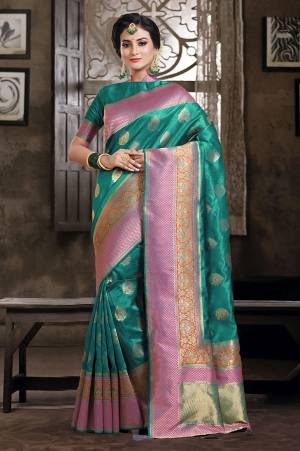 Grab This Designer Silk Based Saree In Teal Green Color Paired With Teal Green Colored Blouse. This Saree And Blouse Are Fabricated On Art Silk Beautified With Weave All Over. Buy Now.