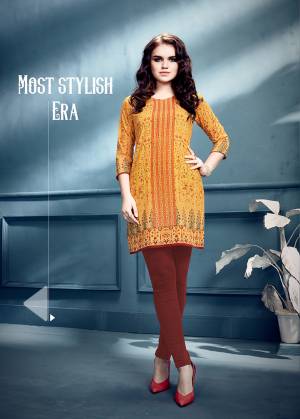 Add Some Casuals With This Readymade Short Kurti In Yellow Color Fabricated On Crepe. It IS Beautified With Prints Which Is Light Weight And Easy To Carry All Day Long. 