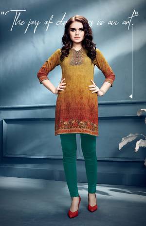 Simple and Elegant Looking Short Kurti Is Here In Yellow And Rust Color. This Readymade Kurti In Crepe Based Beautified With Prints All Over. Buy Now.