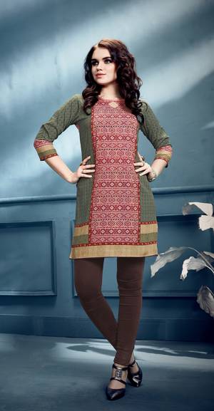 Simple and Elegant Looking Short Kurti Is Here In Pink And Green Color. This Readymade Kurti In Crepe Based Beautified With Prints All Over. Buy Now.