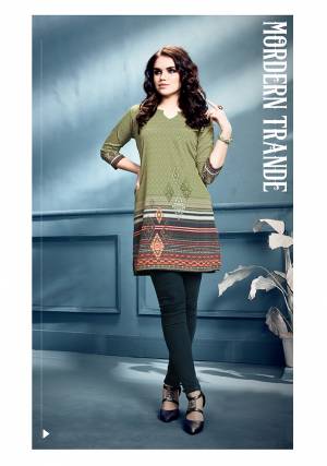 Simple and Elegant Looking Short Kurti Is Here In Green Color. This Readymade Kurti In Crepe Based Beautified With Prints All Over. Buy Now.