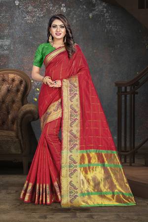 Here Is Proper Traditional Looking Designer Weaved Saree In Red?Color Paired With Contrasting Green Colored Blouse. This Saree Is Fabricated on Cotton Paired With Art Silk Fabricated Blouse. It Is Light Weight And Easy To Carry All Day Long.