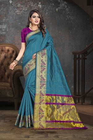 Adorn The Proper Angelic Look Wearing This Lovely Designer Weaved?Saree In Blue Color Paired With Contrasting Purple Colored Blouse. This Saree Is Fabricated On Cotton Paired With Art Silk Fabricated Blouse. Its Rich Fabric Will Give An Enahnced Look To Your Personality.