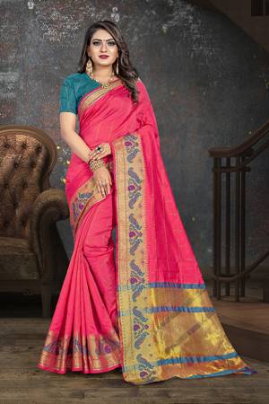 Celebrate This Festive Season With Beauty And Comfort In This Designer Rani Pink Colored Saree Paired With Contrasting Blue Colored Blouse. This Saree Is Cotton Based Paired With Art Silk Fabricated Blouse.