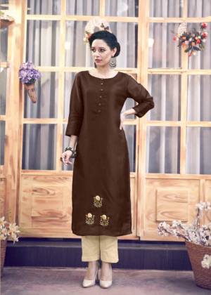 You Will Definitely Earn Lots Of Compliments Wearing This Designer Readymade Kurti In Dark Brown Color Paired With Cream Colored Bottom. The Kurti Is Satin Silk Paied With Silk Blend Bottom. Buy This Kurti Now.