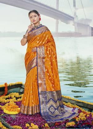 Classy Saree look pretty like never before.Wearing this Orange Color Saree which made from Handloom Silk With Orange Color Handloom Silk blouse, Saree has also decorative work like Heavy Zari Work With Woven.This beautiful Saree features a classy Zari Work