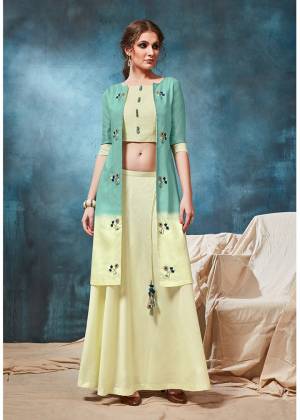 Grab This Designer Readymade Indo-Western Pair In Light Yellow And Sea Green Color Consisting Of A Blouse, Skirt And A Jacket. This Pretty Pair Is Viscosed Based Beautified With hand Work. Buy Now.