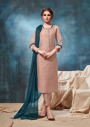Here Is A Very Pretty Shade To Add Into Your Wardrobe With This Readymade Designer Suit In Dusty Peach Color Paired With Teal Blue Colored Dupatta. This Beautiful Suit Has Viscose Based Fabric With Elegant Hand Work.