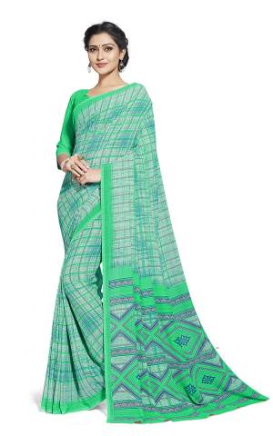 Here Is Very Pretty Printed Saree Fabricated On Georgette Paired With Running Blouse, This Pretty Formal Printed Saree Is Best Suitable For Your Work Place As It Is Light Weight And Esnures Superb Comfort All Day Long. Also It Can Be Used As Uniform At Different Places Like Airports, Hospitals And Hotels. Buy Now