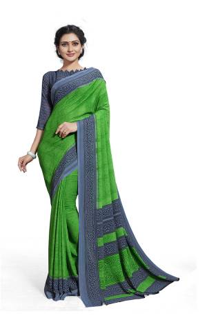 No More Worry For What To Wear At Your Place, Grab This Georgette?Fabricated Saree And Blouse Beautified With Prints All Over. This Saree Can Be Used As Uniform At Different Places Like Airports, Hospitals And Hotels?