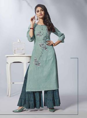 Grab This Beautiful Readymade Pair Of Kurti In Turquoise Blue Color Paired With Blue Colored Bottom. This Kurti Is Viscose Rayon Based Paired With Cotton Fabricated Bottom. It Is Beautified With Hand Work And Available In All Regular Sizes. 