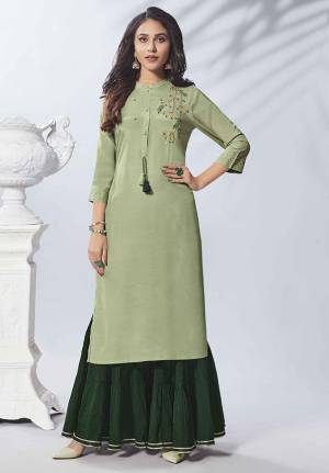Here Is A Very Pretty Readymade Pair Of Kurti And Bottom In Light Green And Dark Green Color Respectively. This Pretty Kurti Is Fabricated On Viscose Rayon Paired With Cotton Fabricated Bottom. Buy Now.