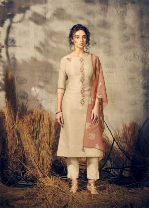 Flaunt Your Rich And Elegant Taste Wearing This Designer Readymade Suit In Beige Color Paired With Light Brown Colored Foil Printed Viscose Dupatta. Also This Suit Is Viscose Based Beautified With Hand Work. 