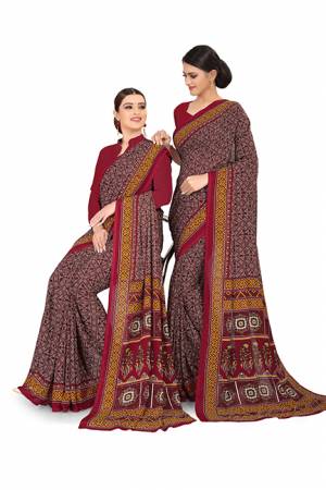 No More Worry For What To Wear At Your Place, Grab This Georgette?Fabricated Saree And Blouse Beautified With Prints All Over. This Saree Can Be Used As Uniform At Different Places Like Airports, Hospitals And Hotels