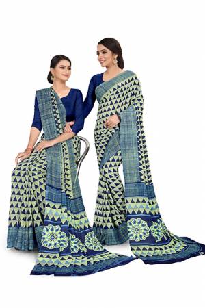 No More Worry For What To Wear At Your Place, Grab This Georgette?Fabricated Saree And Blouse Beautified With Prints All Over. This Saree Can Be Used As Uniform At Different Places Like Airports, Hospitals And Hotels