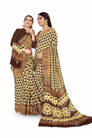 Comfort Is The First Priority When You Go To Your Work Place. So?Keeping Your Comfort In Mind This Printed Saree Is Designed As A Uniform For Your Work Place. This Saree And Blouse are Fabricated On Georgette Beautified With Prints Which Is Also Light In Weight And Easy To Carry All Day Long