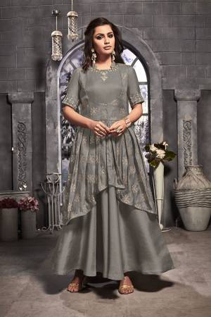 Here Is A New Patterned Designer Readymade Single Piece Dress IS Here In Grey Color. This Pretty Dress Is Fabricated On Satin Silk Beautified With Hand Work. Buy Now.