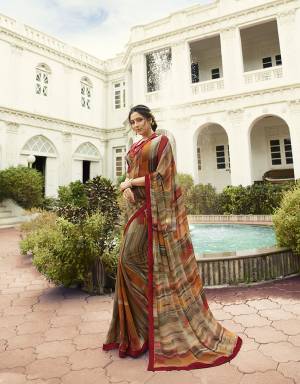 Grab This pretty Multi Colored Designer Printed Saree Paired With Maroon Colored Blouse. This Saree Is Fabricated on Georgette Paired With Art Silk Fabricated Blouse. Buy Now.