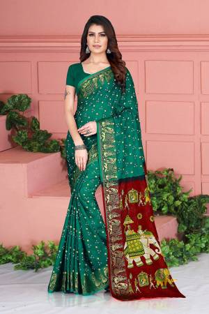 For A Proper Traditional Look, Grab This Designer Silk Based Saree In Teal Green Color. This Saree And Blouse Are Fabricated On Art Silk Beautified With Weave And Prints. Its Fabric Is Durable, Light Weight And Easy To Carry All Day Long. 