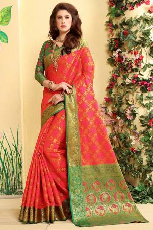 Here Is A Prefectly Suitable Designer Silk Based Saree For The Upcoming Festive And Wedding Season. This Pretty Saree In Dark Pink Color Paired With Green Colored Blouse. This Saree And Blouse Are Fabricated Patola Jacquard Silk Beautified Attractive Detailed Weave All over. Buy This Rich Designer Saree Now.