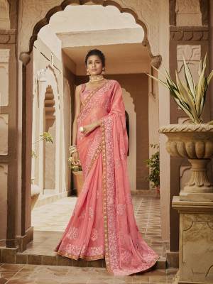 Look Pretty Wearing This Heavy Designer Saree In Pink Color Paired With Pink Colored Blouse. This Saree Is Fabricated On Chinon Paired With Art Silk Fabricated Blouse. It Is Beautified With Pretty Tone To Tone Embroidery. Buy Now.