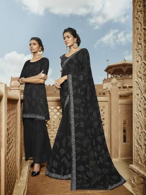 For A Bold And Beautiful Look, Grab This Heavy Designer Saree In Black Color Paired With Black Colored Blouse, This Pretty Saree Is Georgette Based Paired With Art Silk Fabricated Blouse. It Is Beautified With Pretty Tone To Tone Embroidery. 