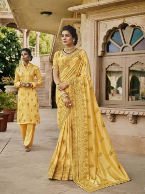 You Will Definitely Earn Lots Of Compliments Wearing This Heavy Designer Attractive Looking Saree In Yellow Color Paired With Yellow Colored Blouse. This Saree Is Satin Based Paired With Art Silk Fabricated Blouse. Buy This Lovely Saree Now.
