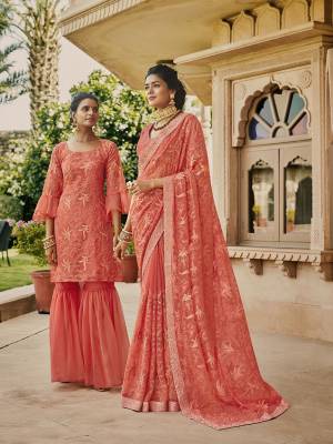 Look Pretty Wearing This Heavy Designer Saree In Dark Peach Color Paired With Dark Peach Colored Blouse. This Saree Is Fabricated On Chinon Paired With Art Silk Fabricated Blouse. It Is Beautified With Pretty Tone To Tone Embroidery. Buy Now.