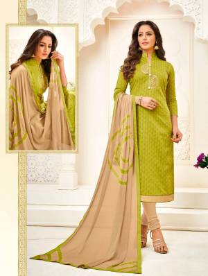 Add This Designer Straight Suit In Green Colored Top Paired With Beige Colored Bottom And Dupatta. Its Top Is Fabricated On Cotton Jacquard Paired With Cotton Bottom And Chiffon Fabricated Dupatta. It Is Beautified With Hand Work. Buy Now.