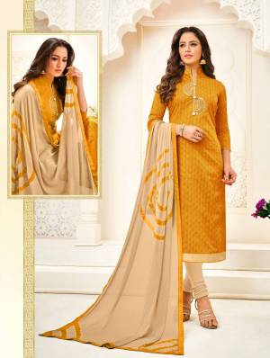 Add This Designer Straight Suit In Musturd Yellow Colored Top Paired With Beige Colored Bottom And Dupatta. Its Top Is Fabricated On Cotton Jacquard Paired With Cotton Bottom And Chiffon Fabricated Dupatta. It Is Beautified With Hand Work. Buy Now.
